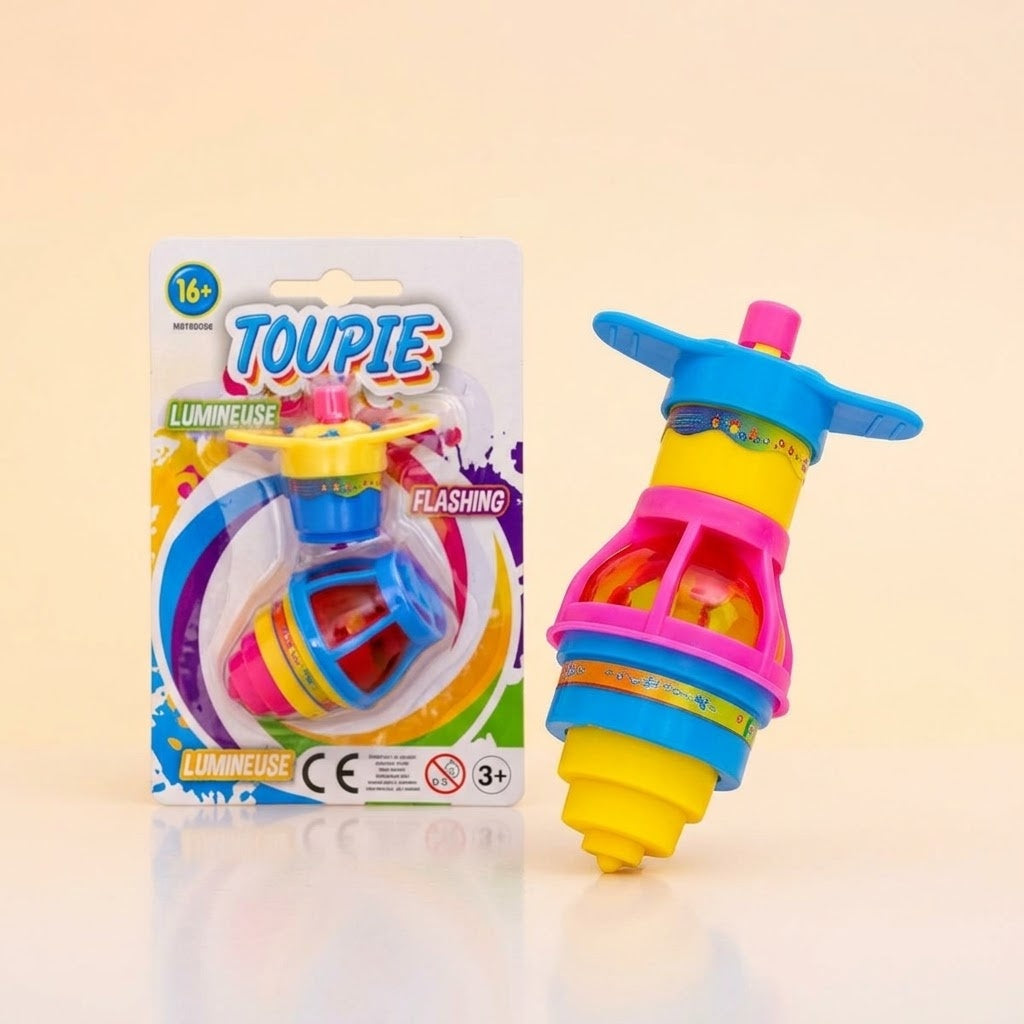 Light-Up Spinning Top with Launcher 6 cm - studio photo