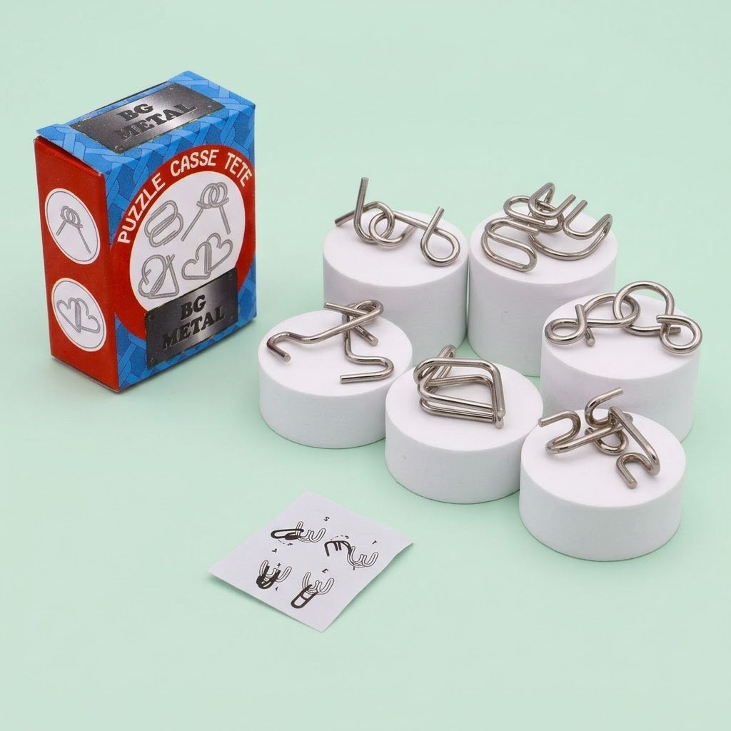 Metal Puzzle Brain Teaser in Box 8 Designs - studio photo