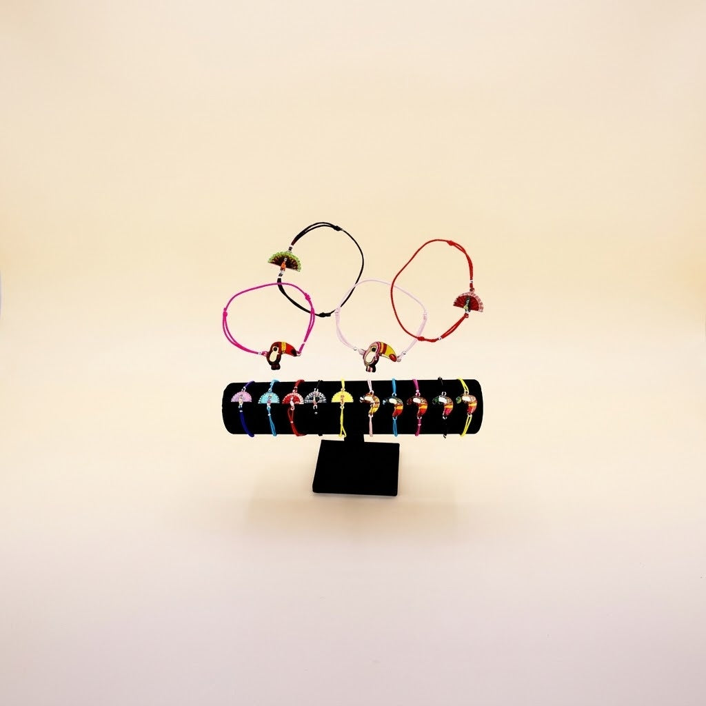 Elastic Bracelet with Toucan or Peacock Charm - studio photo