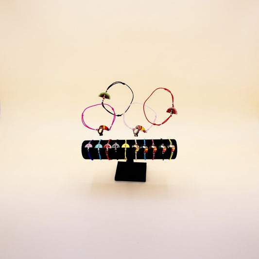 Elastic Bracelet with Toucan or Peacock Charm - studio photo