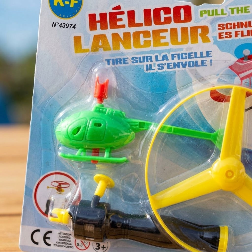 Pull String Flying Helicopter Toy with Launcher - close-up
