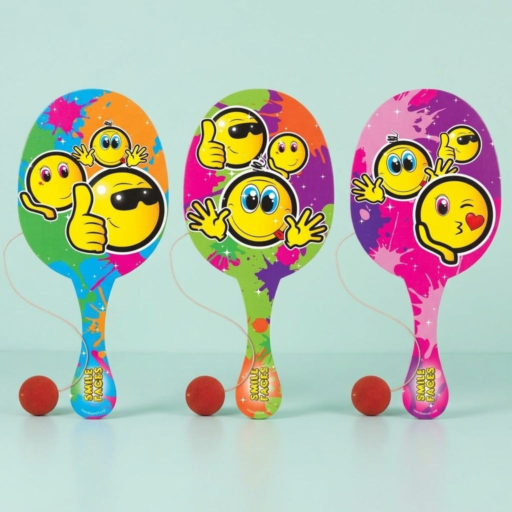 Wooden Paddle Ball Smiley Face Bat 21 cm - studio photo