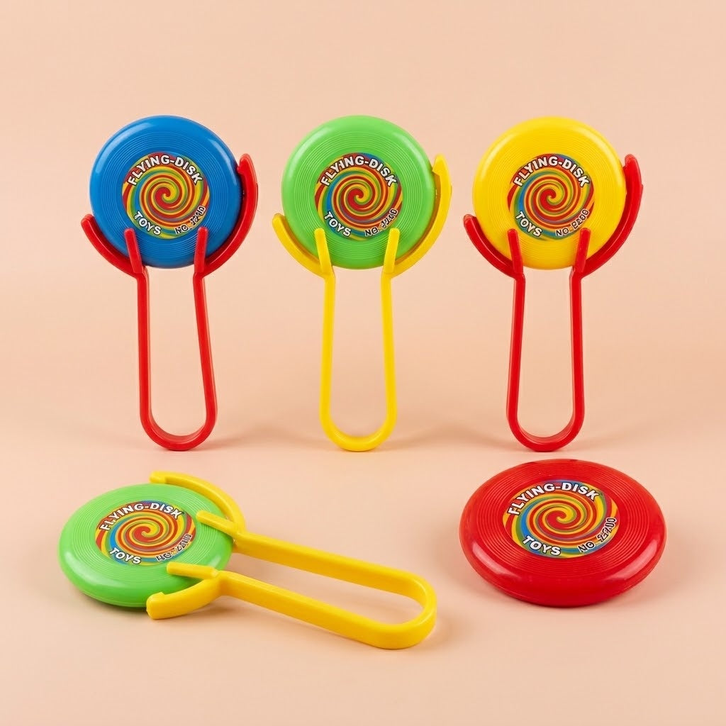 Flying Saucer Launcher Toy 5.5 cm Disc - studio photo