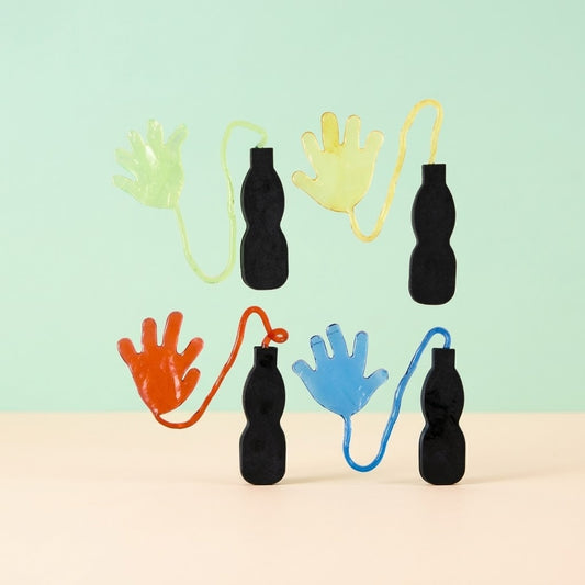 Sticky Hand on Handle 25 cm Stretchy Slap Toy - studio photo